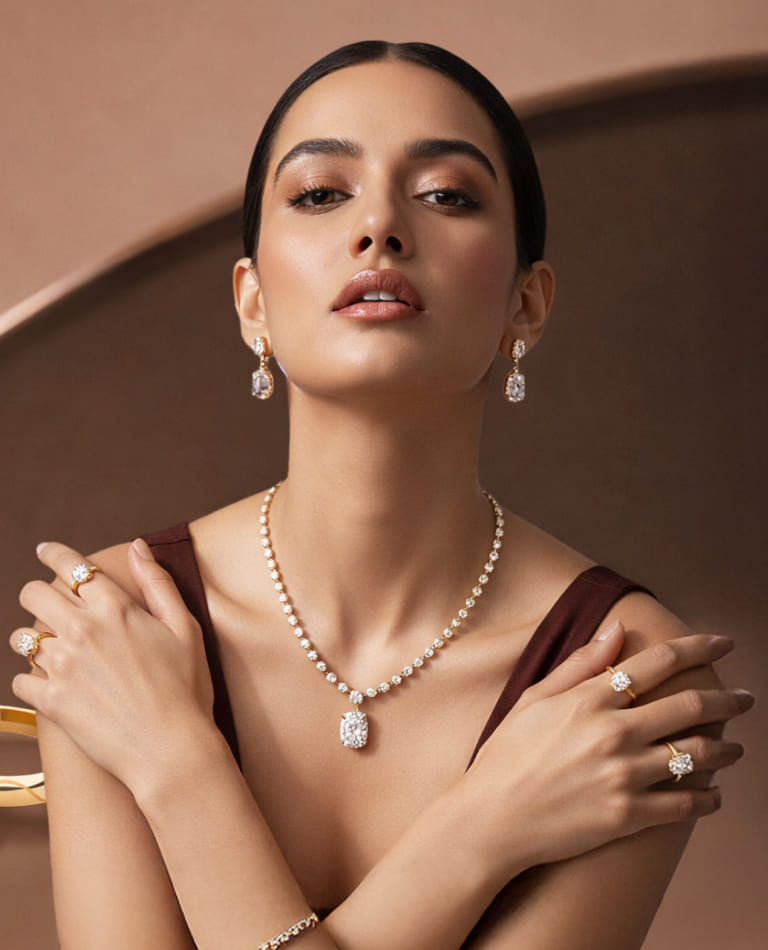 Woman wearing a pearl necklace, earrings, and rings against a brown background