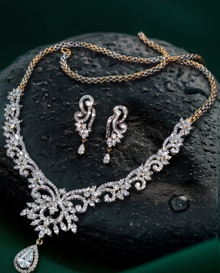Diamond necklace and earrings set on a dark stone surface